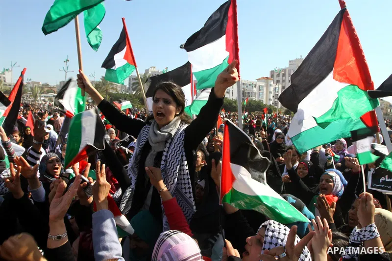 Palestinian demonstrators take part in a rally calling for Palestinian political unity between Gaza's Hamas rulers and the Fatah-dominated Palestinian Authority which rules from Ramallah, on March 15, 2011in Gaza City, a...
