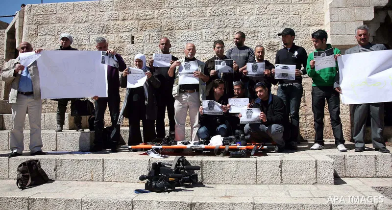 Sit-in organized by Palestinian journalists in the Damascus Gate in East Jerusalem to stop the ongoing attacks against jounalists in many areas in Palestine and other countries on16 March 2011.Photo by Sliman Khader.