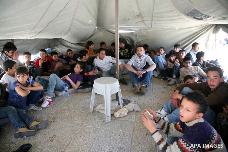 Palestinian students camping in the courtyard of the Nativity in Bethlehem, calling for national Palestinian reconciliation on17 March 2011.Photo by Sliman Khader..