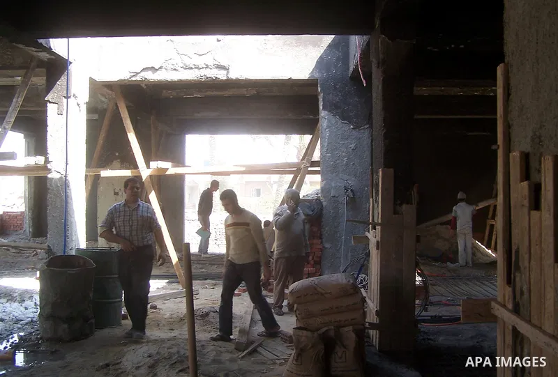 Egyptian workers take part in the rebuilding of a church in the village of Soul, south of Cairo, Egypt, Thuresday, March 17, 2011. The Egyptian army started the rebuilding of a church in Soul that was torched by a Muslim...