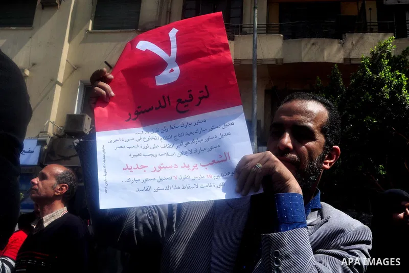 Egyptians shout anti- constitutional amendments slogans during a protest at Tahrir Square in Cairo, Egypt, Friday, March 18, 2011 a day before the referendum . Civic groups have raised fears that the timing of a Saturday...