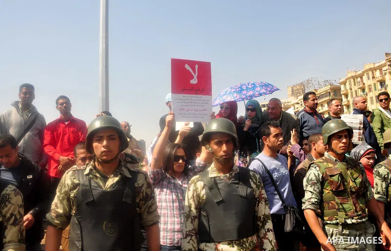 Egyptians shout anti- constitutional amendments slogans during a protest at Tahrir Square in Cairo, Egypt, Friday, March 18, 2011 a day before the referendum . Civic groups have raised fears that the timing of a Saturday...
