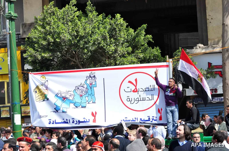 Egyptians shout anti- constitutional amendments slogans during a protest at Tahrir Square in Cairo, Egypt, Friday, March 18, 2011 a day before the referendum . Civic groups have raised fears that the timing of a Saturday...
