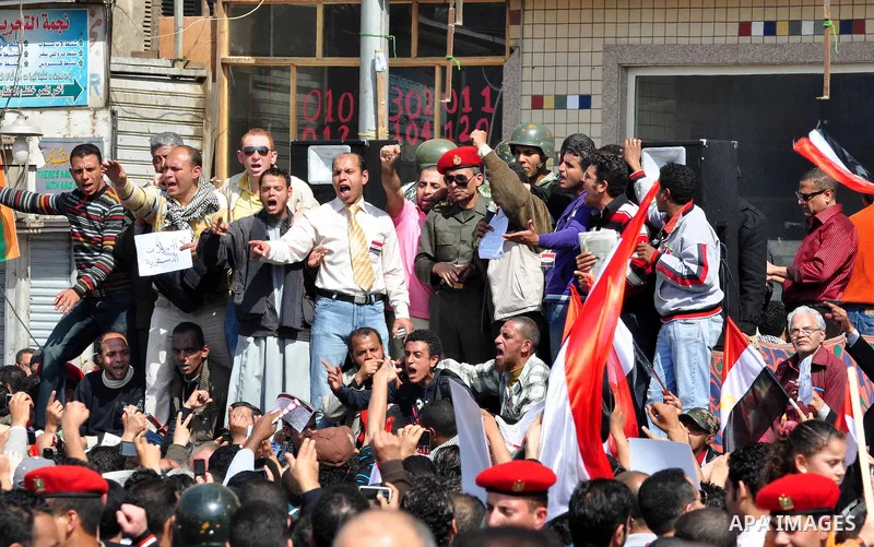 Egyptians shout anti- constitutional amendments slogans during a protest at Tahrir Square in Cairo, Egypt, Friday, March 18, 2011 a day before the referendum . Civic groups have raised fears that the timing of a Saturday...