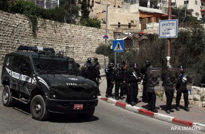 Israeli soldiers fire tear gas canisters towards Palestinian demonstrators during the clashes after Friday prayers in Jerusalem's neighbourhood of silwan on March 18, 2011. Photo by Mahfouz Abu Turk