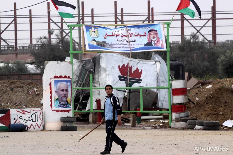 Palestinian looks at the damage after Israeli strikes on the Gaza Strip. Israeli strikes on the Gaza Strip wounded five Hamas security officers and a boy on Saturday after militants launched mortar bombs into Israel, lig...