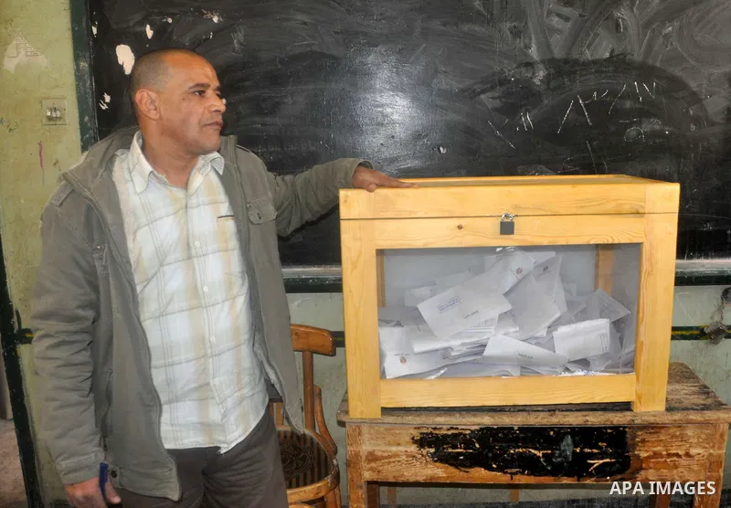 Egyptians cast their vote during a national referendum, at a school in Cairo. Egyptians flocked to the polls on Saturday in a historic referendum on changes to the constitution. The amendments were proposed by a judicial...