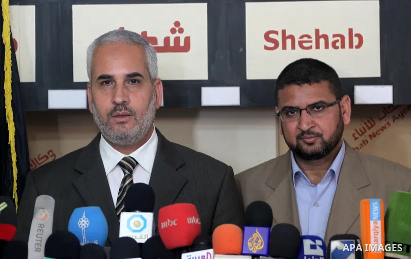 Palestinian Hamas leaders Fawzi Barhoum and Sami Abu Zuhri deliver speech during a press conference discussing the latest political developments in Gaza City on March 19,2011. Photo by Mohammed Asad