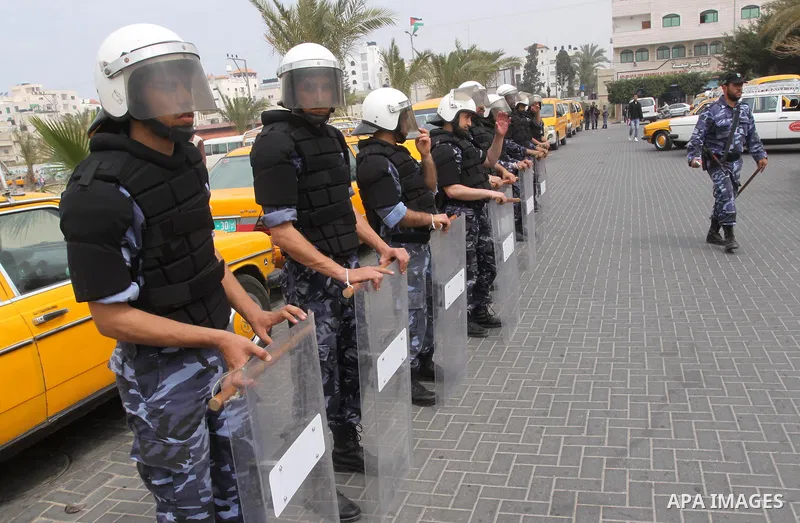 Palestinian riot police participate in a march in Gaza City on March 20, 2011. Photo by Mohammed Asad