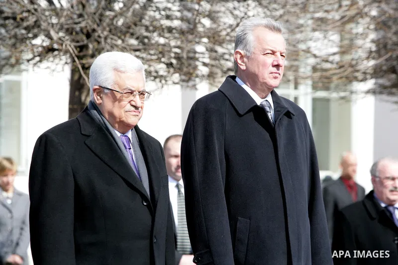 Palestinian President Mahmoud Abbas and Hungarian President Pal Schmitt review an honour guard in front of the presidental palace in Budapest on March 21, 20011 during a welcoming ceremony. The Palestinian National Counc...