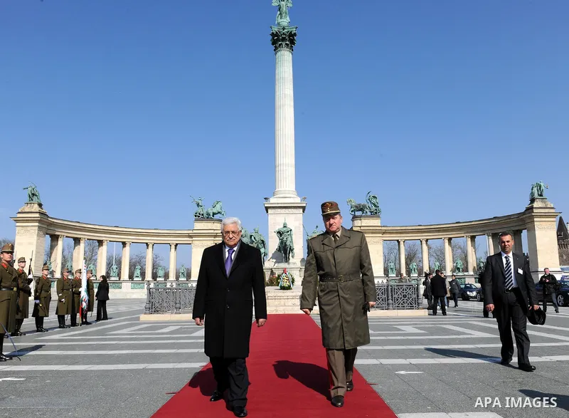 Palestinian President Mahmoud Abbas lays a wreath at the monument of the Unknown Soldier at Heroes Square in Budapest on March 21, 20011. The Palestinian National Council was saddened by the bloodshed in Libya's month-lo...