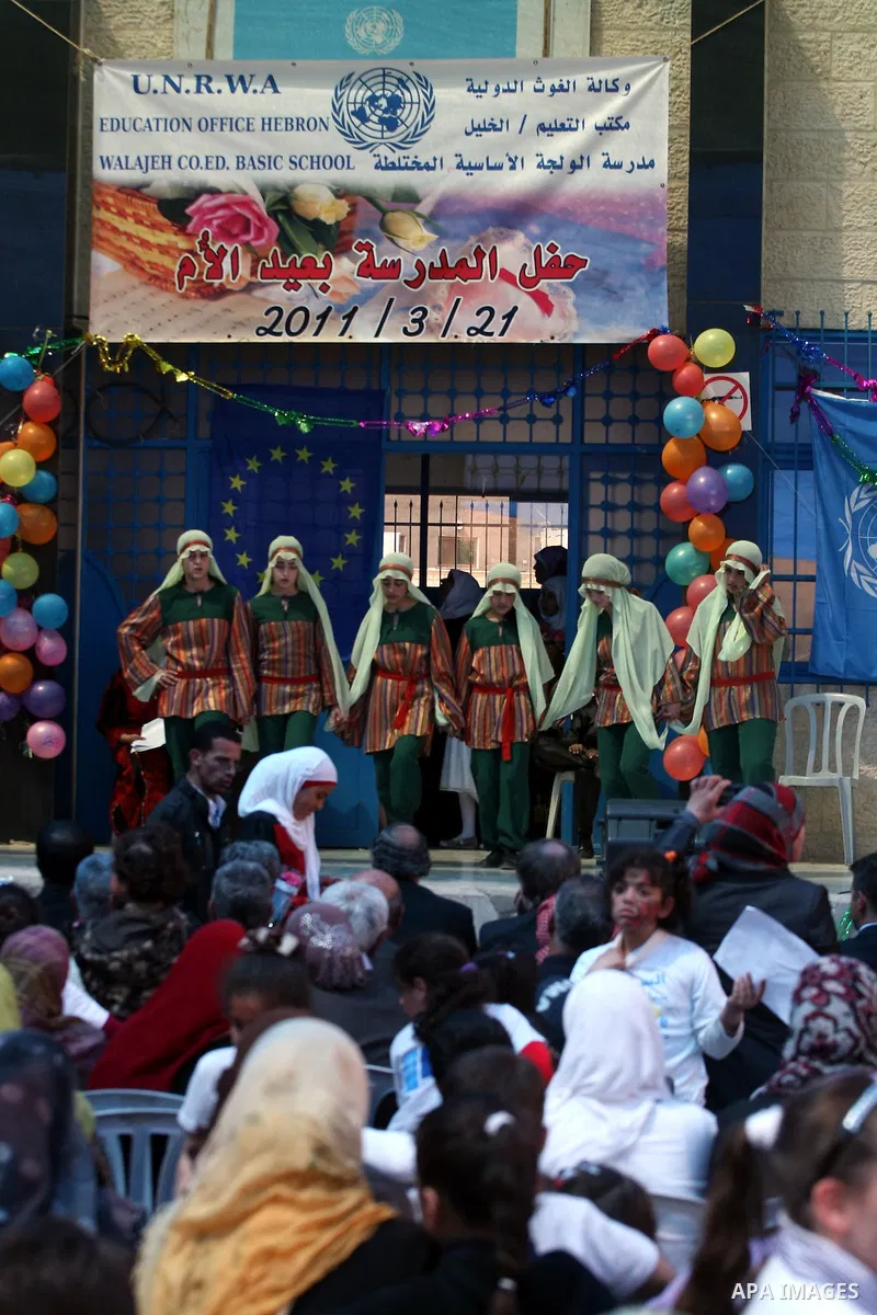 Palestinian women attend a celebration at Al-Walajah school on the occasion of Mother Day in Walajah village near the West Bank city of Bethlehem on March 21, 2011. Photo by Issam Rimawi