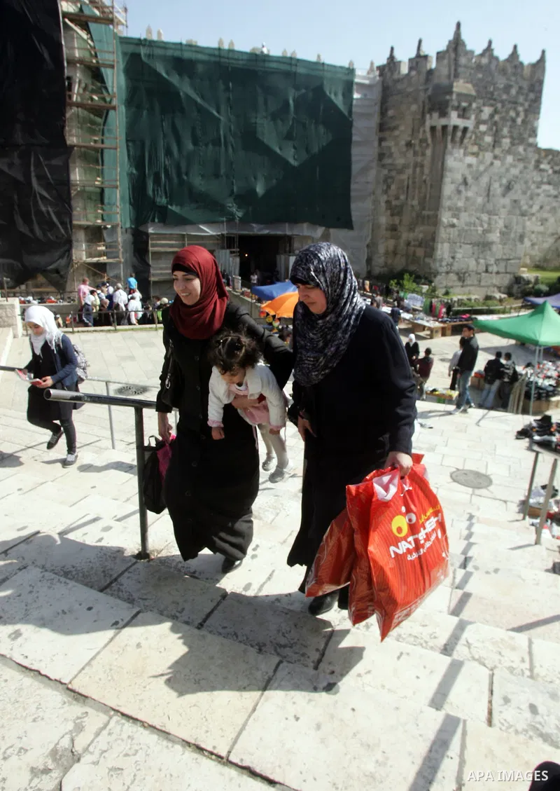 Palestinian women show their home made tradition works during an exhibition in the ocassion of the Mother Day at Jerusalem youth club, in Jerusalem on March 21, 2011. Photo by Mahfouz Abu Turk