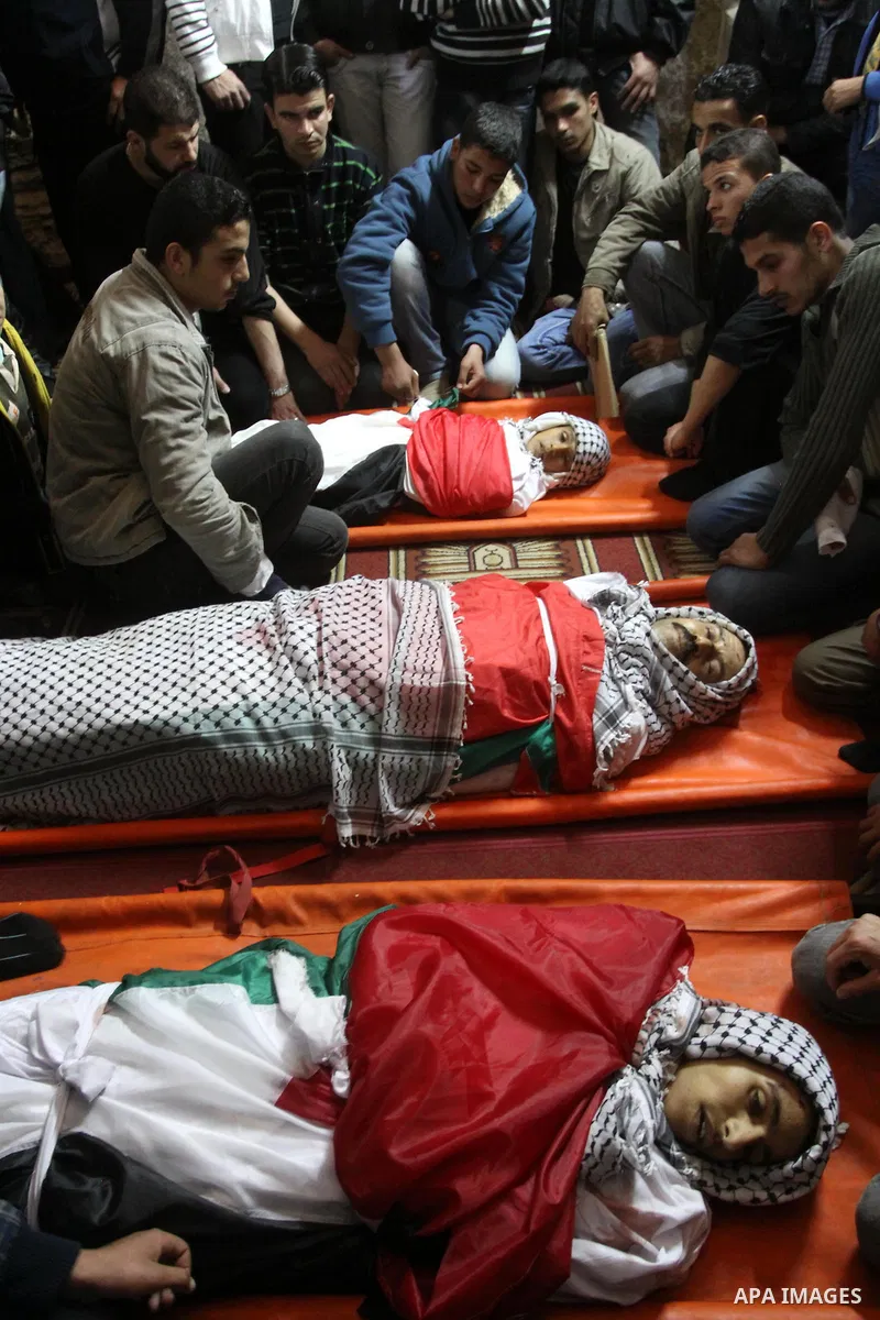 Palestinian mourners attend a funeral at a mosque in Gaza City on March 23, 2011 a day after eight Gazans were killed, among them two minors and four militants, as tensions soared on the border with Israel after days of...