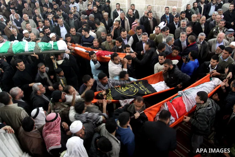 Palestinian mourners attend a funeral at a mosque in Gaza City on March 23, 2011 a day after eight Gazans were killed, among them two minors and four militants, as tensions soared on the border with Israel after days of...
