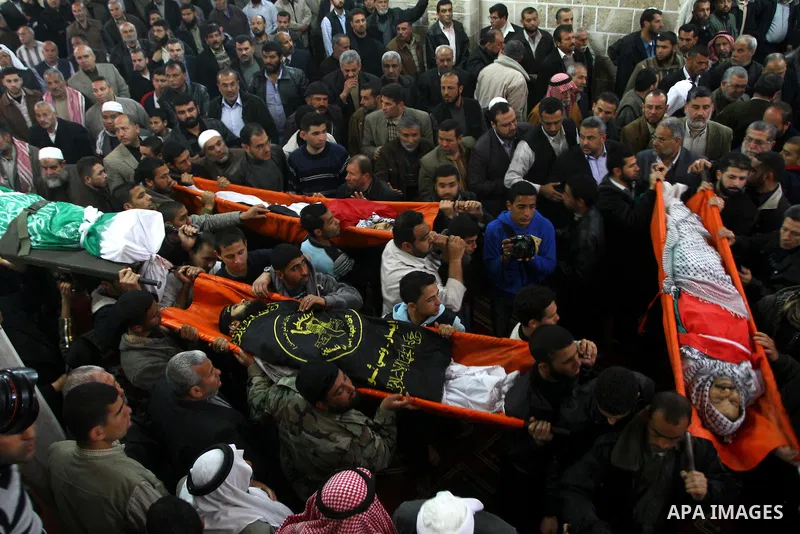 Palestinian mourners attend a funeral at a mosque in Gaza City on March 23, 2011 a day after eight Gazans were killed, among them two minors and four militants, as tensions soared on the border with Israel after days of...