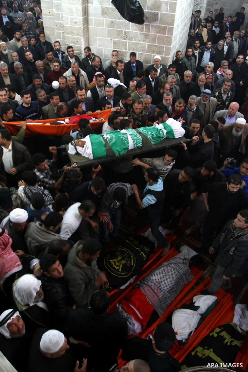 Palestinian mourners attend a funeral at a mosque in Gaza City on March 23, 2011 a day after eight Gazans were killed, among them two minors and four militants, as tensions soared on the border with Israel after days of...