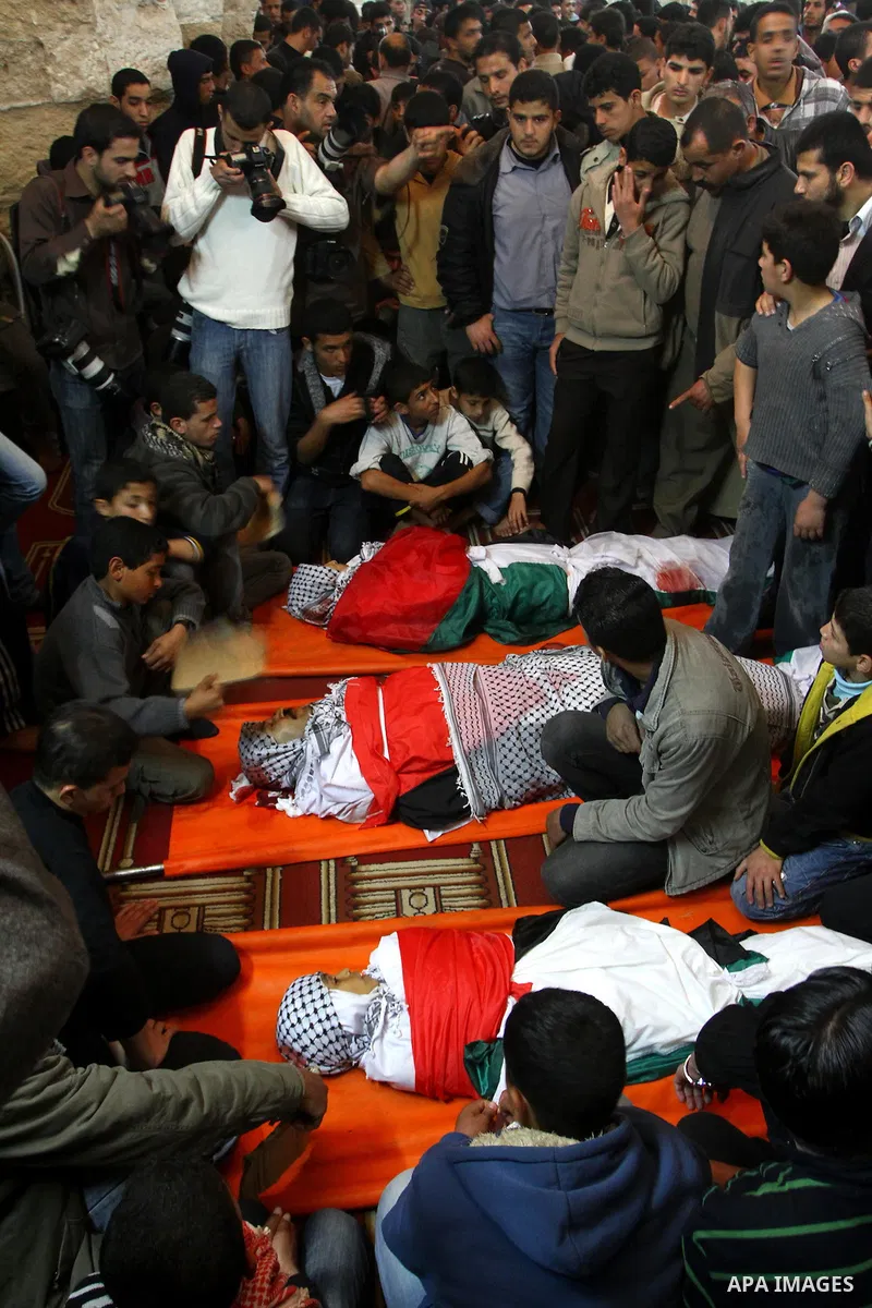 Palestinian mourners attend a funeral at a mosque in Gaza City on March 23, 2011 a day after eight Gazans were killed, among them two minors and four militants, as tensions soared on the border with Israel after days of...