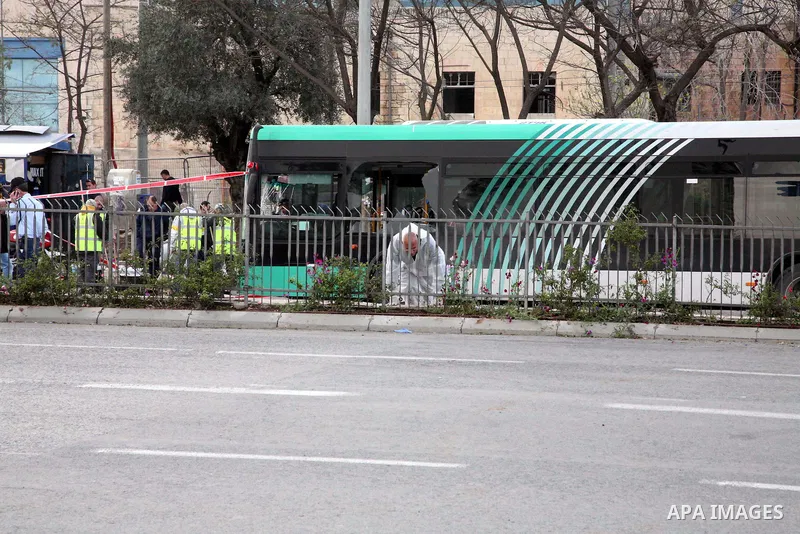 Israeli police patrol at the scene of a bomb attack at a bus station in Jerusalem blowing up next to the bus and near a kiosk, called the 'Explosive Kiosk', on 23 March 2011. Over 30 people were injured by a parcel bomb...