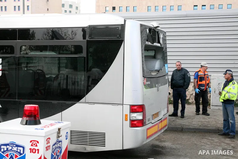 Israeli police patrol at the scene of a bomb attack at a bus station in Jerusalem blowing up next to the bus and near a kiosk, called the 'Explosive Kiosk', on 23 March 2011. Over 30 people were injured by a parcel bomb...