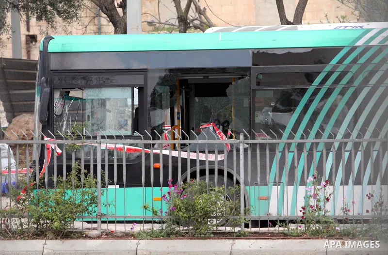 Israeli police patrol at the scene of a bomb attack at a bus station in Jerusalem blowing up next to the bus and near a kiosk, called the 'Explosive Kiosk', on 23 March 2011. Over 30 people were injured by a parcel bomb...