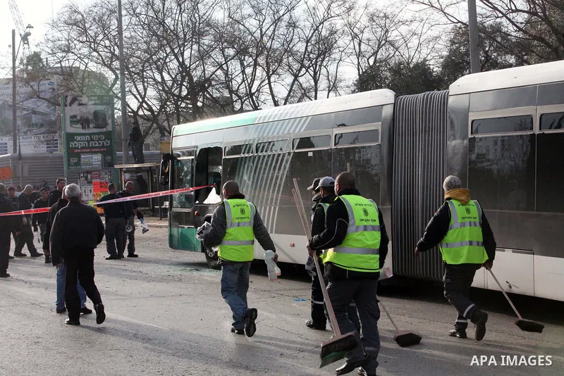 Israeli police patrol at the scene of a bomb attack at a bus station in Jerusalem blowing up next to the bus and near a kiosk, called the 'Explosive Kiosk', on 23 March 2011. Over 30 people were injured by a parcel bomb...