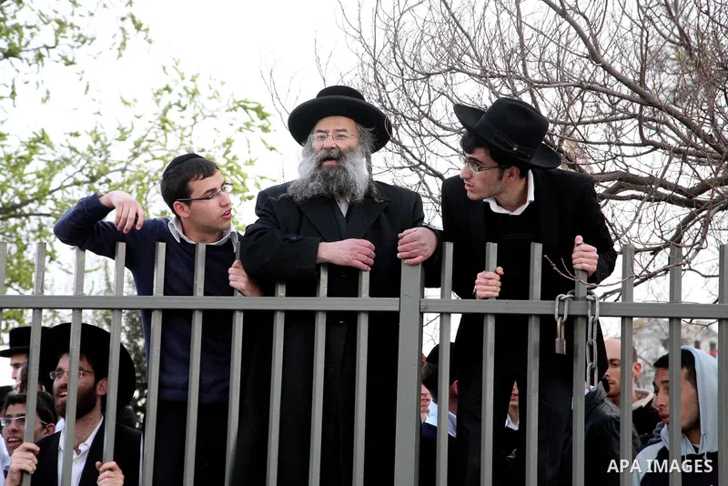 Israeli police patrol at the scene of a bomb attack at a bus station in Jerusalem blowing up next to the bus and near a kiosk, called the 'Explosive Kiosk', on 23 March 2011. Over 30 people were injured by a parcel bomb...