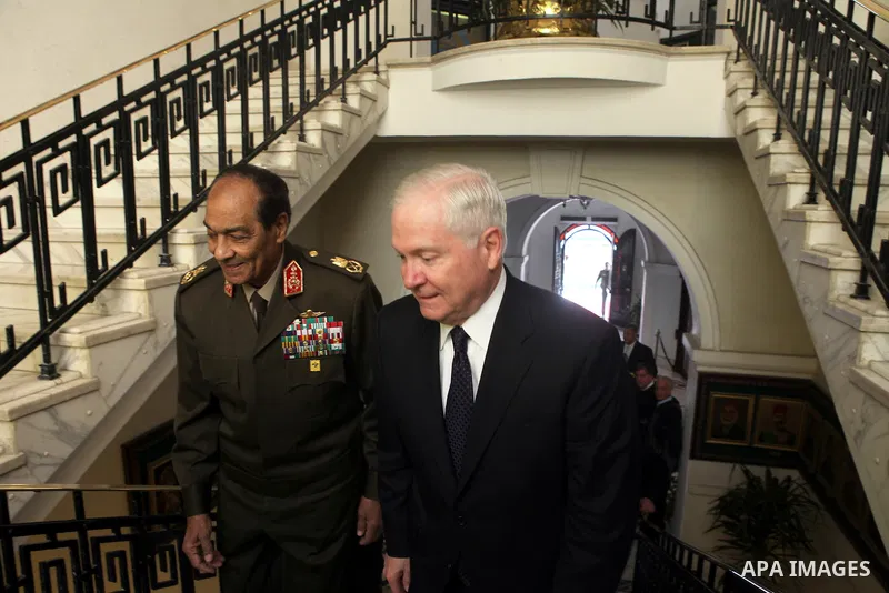 US Defense Secretary Robert Gates (R) and the Chairman of the Egyptian Supreme Council of Armed Forces, Mohammed Hussein Tantawi (L) arrive for their meeting at the Defense Ministry, in Cairo, on March 24, 2011. Photo by...