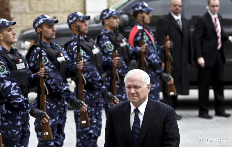 U.S Defense Secretary Robert Gates meets with Palestinian Prime Minister Salam Fayyad in the West Bank city of Ramallah March 25, 2011. Gates urged Israeli and Palestinian leaders on Thursday to advance stalled peace eff...