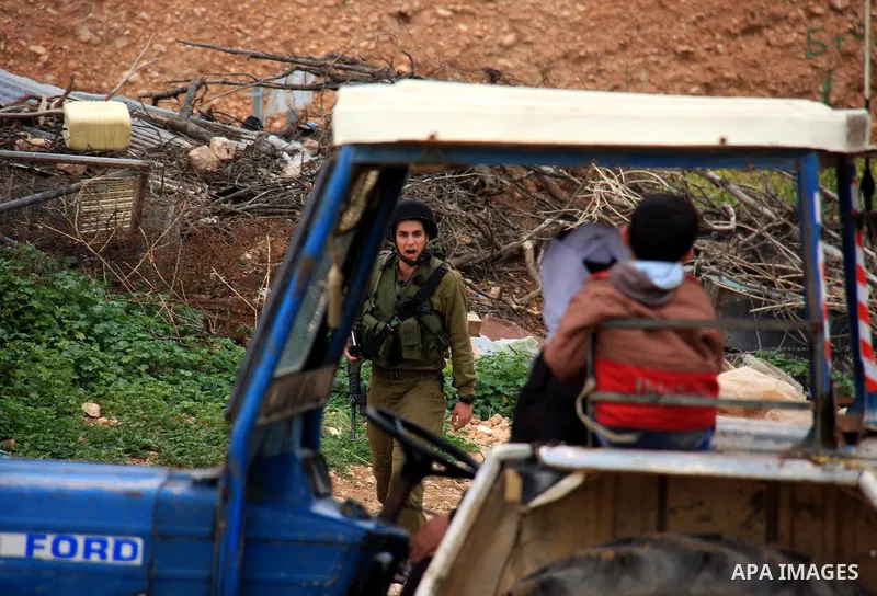 Israeli troops shut down al-Hamra checkpoint during a military operation searching for explosives on the outskirts of the West Bank Jordan Valley, Friday, March 25, 2011. Photo by Wagdi Eshtayah