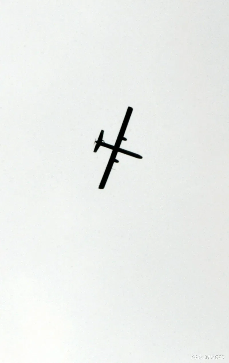 An Israeli drone is seen over the city of Rafah in the southern Gaza Strip on March 25,2011, as Israeli aircraft attacked four targets in the Gaza Strip during the night, lightly wounding three people, in response to Pal...