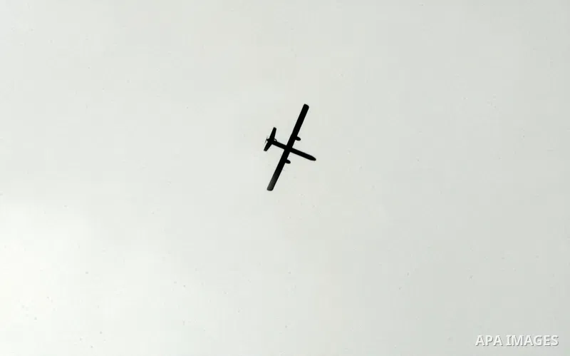 An Israeli drone is seen over the city of Rafah in the southern Gaza Strip on March 25,2011, as Israeli aircraft attacked four targets in the Gaza Strip during the night, lightly wounding three people, in response to Pal...