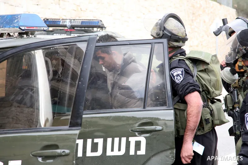 Israeli Border Police detain a Palestinian youth during clashes in the mostly Arab neighborhood of Silwan in East Jerusalem March 25, 2011. Photo by Sliman Khader..