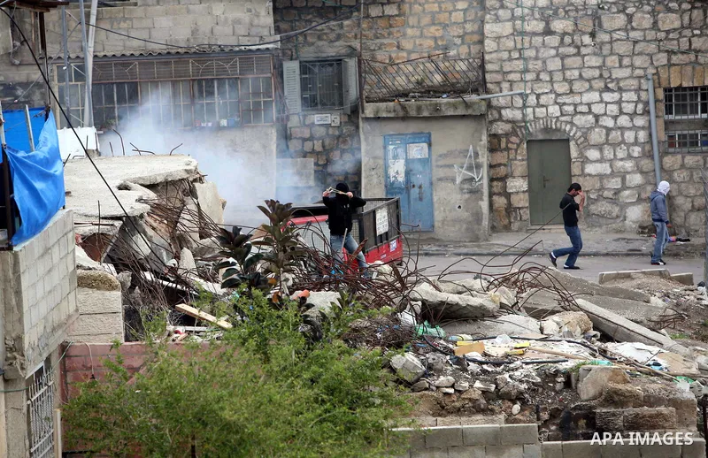 Israeli Border Police fire tear gas towards Palestinian stone throwers during clashes in the mostly Arab neighborhood of Silwan in East Jerusalem March 25, 2011. Photo by Sliman Khader..