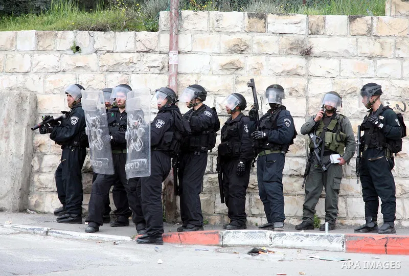 Israeli Border Police fire tear gas towards Palestinian stone throwers during clashes in the mostly Arab neighborhood of Silwan in East Jerusalem March 25, 2011. Photo by Sliman Khader..