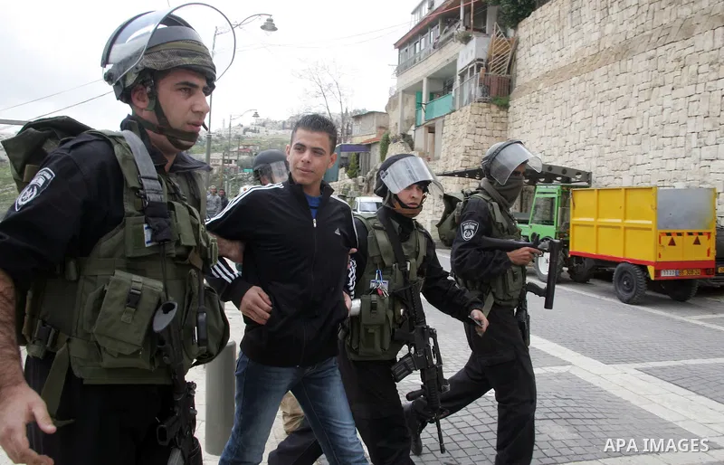Israeli Border Police detain a Palestinian youth during clashes in the mostly Arab neighborhood of Silwan in East Jerusalem March 25, 2011. Photo by Mahfouz Abu Turk