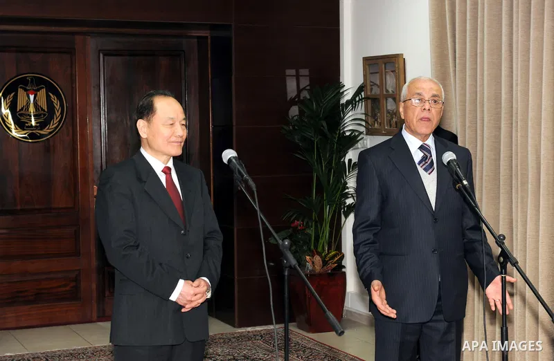 Palestinian Secretary General of the Presidency Tayeb Abdel Rahim with the Chinese president's envoy to the peace process in the Middle East during a press conference in west bank city of Ramallah March 25,2011 photo by...