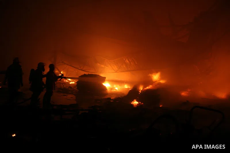 Palestinian firemen fighting the fire broke out in a soft drinks factory in Gaza after huge explosion hit the place in zeiton neighborhood Gaza city. March 25 2011. Despite Israel military said none of its forces were op...