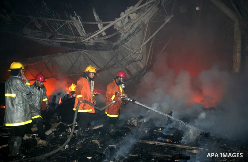 Palestinian firemen fighting the fire broke out in a soft drinks factory in Gaza after huge explosion hit the place in zeiton neighborhood Gaza city. March 25 2011. Despite Israel military said none of its forces were op...