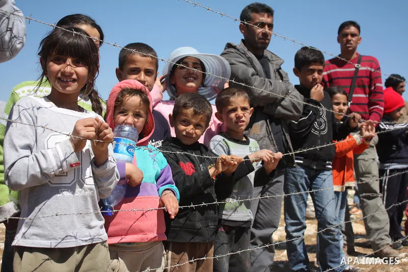 Palestinian children take part in a protest against Jewish settlers in the West Bank village of Yatta, south of the West Bank city of Hebron, on 26 March 2011.Photo by Najeh Hahlamoun