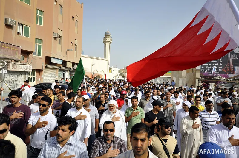 Pro-reforms protesters march during the funeral of 71-year-old Isa Mohammed in Maamer village south east of the capital Manama, Bahrain, 26 March 2011. According to local media reports, Mohammed died on 25 March after te...