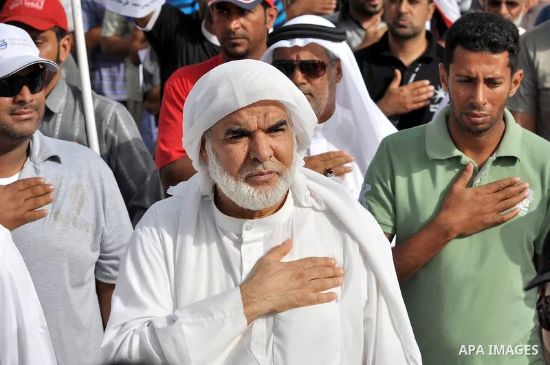 Pro-reforms protesters march during the funeral of 71-year-old Isa Mohammed in Maamer village south east of the capital Manama, Bahrain, 26 March 2011. According to local media reports, Mohammed died on 25 March after te...