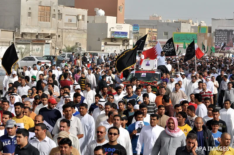 Pro-reforms protesters march during the funeral of 71-year-old Isa Mohammed in Maamer village south east of the capital Manama, Bahrain, 26 March 2011. According to local media reports, Mohammed died on 25 March after te...
