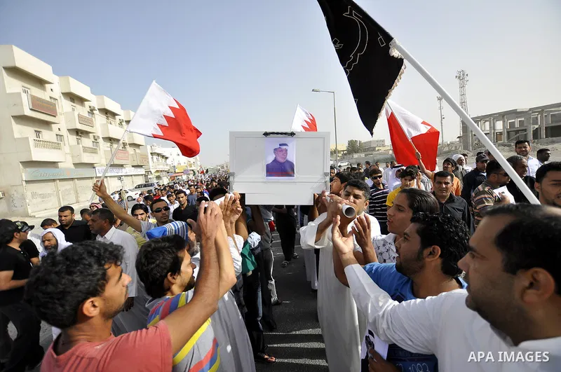 Pro-reforms protesters march during the funeral of 71-year-old Isa Mohammed in Maamer village south east of the capital Manama, Bahrain, 26 March 2011. According to local media reports, Mohammed died on 25 March after te...