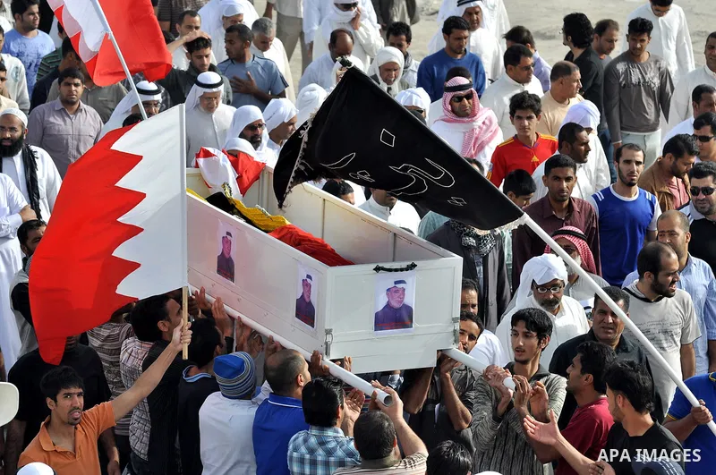 Pro-reforms protesters march during the funeral of 71-year-old Isa Mohammed in Maamer village south east of the capital Manama, Bahrain, 26 March 2011. According to local media reports, Mohammed died on 25 March after te...