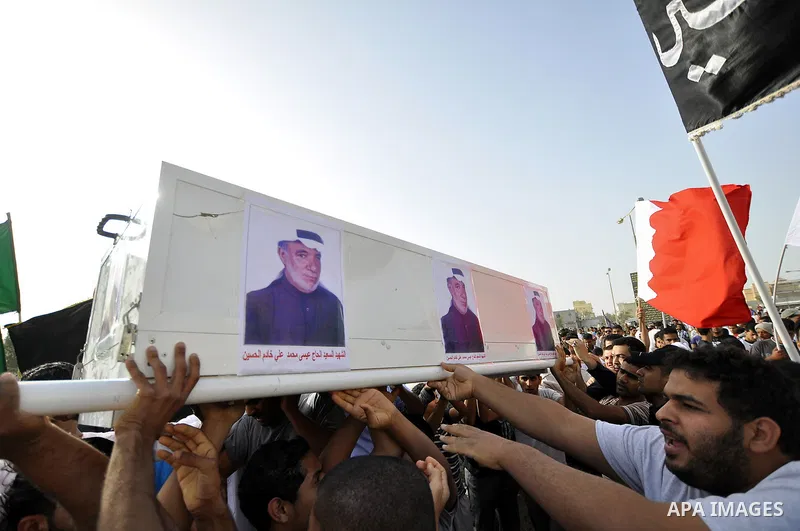 Pro-reforms protesters march during the funeral of 71-year-old Isa Mohammed in Maamer village south east of the capital Manama, Bahrain, 26 March 2011. According to local media reports, Mohammed died on 25 March after te...