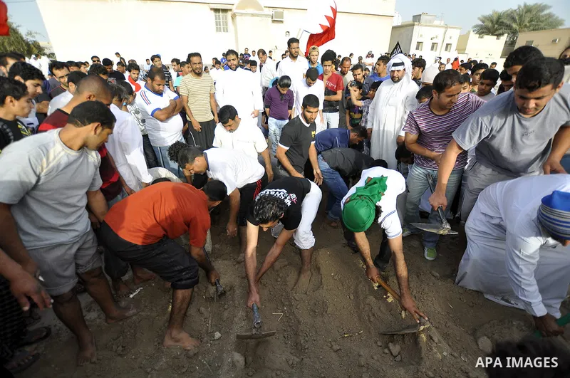 Pro-reforms protesters march during the funeral of 71-year-old Isa Mohammed in Maamer village south east of the capital Manama, Bahrain, 26 March 2011. According to local media reports, Mohammed died on 25 March after te...