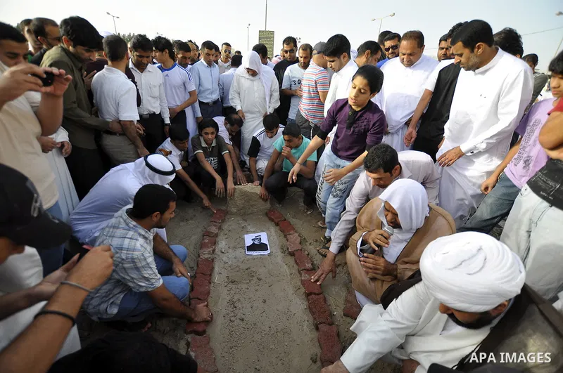 Pro-reforms protesters march during the funeral of 71-year-old Isa Mohammed in Maamer village south east of the capital Manama, Bahrain, 26 March 2011. According to local media reports, Mohammed died on 25 March after te...