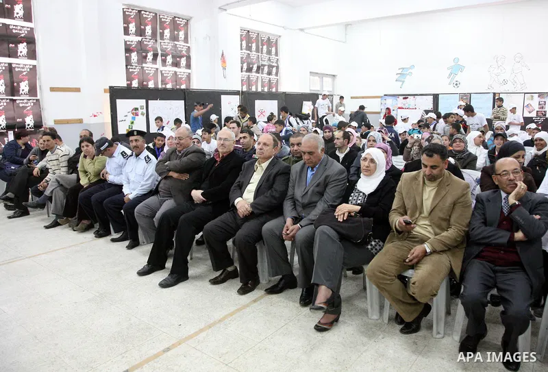 Palestinians take part in a festival under the title 'yes to life, yes to sports, no drug', in Al-Ram in the West Bank with the participation of the Directorate of Education and Jerusalem Institute and under the auspices...