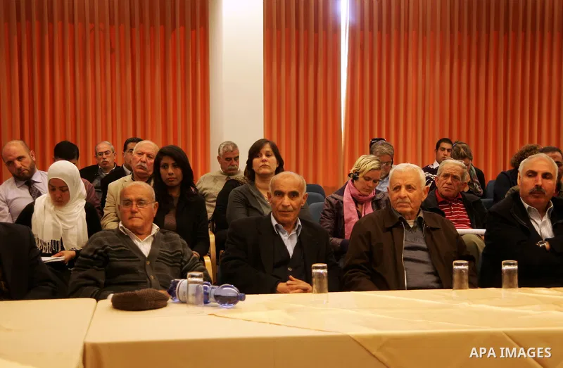 Palestinians attend a press conference in Jeruslam's old city on March 29,2011, to discuss the Israel Lands Administration decision to put the territory of Lafta for sale to the private sector. Photo by Mahfouz Abu Turk